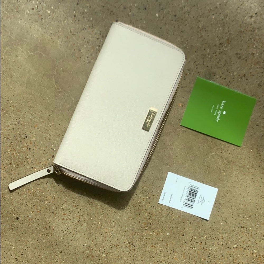 never been used late spade wallet!